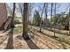 Lush backyard with mature trees and landscaping at 1386 Wesley Nw Cir, Atlanta, GA 30327