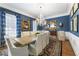 Elegant dining room with blue walls, a chandelier, and seating for ten at 1386 Wesley Nw Cir, Atlanta, GA 30327