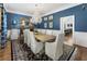 Elegant dining room with blue walls, chandelier, and seating for ten at 1386 Wesley Nw Cir, Atlanta, GA 30327