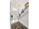 Two-story foyer features marble flooring and a stunning chandelier at 1386 Wesley Nw Cir, Atlanta, GA 30327