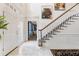 Bright foyer with marble floors and view into another room at 1386 Wesley Nw Cir, Atlanta, GA 30327