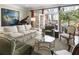 Elegant living room with piano and french doors leading to an outdoor area at 1386 Wesley Nw Cir, Atlanta, GA 30327