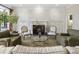 Spacious living room with fireplace, built-in cabinets and elegant decor at 1386 Wesley Nw Cir, Atlanta, GA 30327
