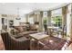 Open concept kitchen and living area with natural light creating a seamless flow for entertaining and relaxation at 1386 Wesley Nw Cir, Atlanta, GA 30327