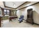 Spacious office with custom cabinets, a built-in bookcase, and dark wood trim at 1386 Wesley Nw Cir, Atlanta, GA 30327