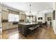 Bright open floor plan seamlessly connects the kitchen, living, and dining areas, perfect for modern living at 1386 Wesley Nw Cir, Atlanta, GA 30327