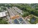 Aerial view featuring a neighborhood close to an attractive green space with a pond and walking trails at 375 Banbury Xing, Alpharetta, GA 30009