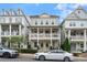 Charming two-story home with a welcoming front porch and balcony in a desirable neighborhood at 375 Banbury Xing, Alpharetta, GA 30009