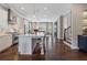 Modern kitchen with white cabinetry, stainless steel appliances, and a spacious island, ideal for culinary enthusiasts at 375 Banbury Xing, Alpharetta, GA 30009
