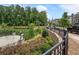 Beautiful pond view with walking path creating a scenic environment for a relaxing stroll or enjoying the outdoors at 375 Banbury Xing, Alpharetta, GA 30009