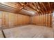 Unfinished basement with exposed wooden framing, offering potential for customization at 7285 Cordery Rd, Cumming, GA 30040