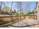 Spacious wooden back deck with natural sunlight is ideal for entertaining or relaxing in your backyard at 2647 Brickell Sq, Atlanta, GA 30341