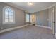 Bedroom with a large window and view into the ensuite bathroom at 2647 Brickell Sq, Atlanta, GA 30341