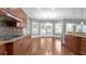 Bright kitchen with granite counters, stainless steel appliances and a large window offering natural light and backyard views at 2647 Brickell Sq, Atlanta, GA 30341