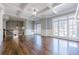 Bright living room with large windows, hardwood floors, and coffered ceilings at 2647 Brickell Sq, Atlanta, GA 30341