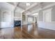 Spacious living room with hardwood floors, fireplace, and built-in shelving at 2647 Brickell Sq, Atlanta, GA 30341