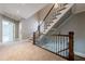 Beautiful staircase with decorative iron railing and carpeted steps leading to the upper level at 2647 Brickell Sq, Atlanta, GA 30341