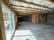 Spacious unfinished basement with insulated ceiling, sliding glass doors and concrete flooring at 41 Okeechobee Way, Braselton, GA 30548