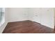This bright bedroom features dark wood floors and plentiful closet space at 6945 W Mountain Xing, Cumming, GA 30041