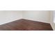 Bedroom with hardwood floors, ample natural light, and neutral paint at 6945 W Mountain Xing, Cumming, GA 30041