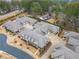 Expansive aerial view of new construction townhomes with manicured landscaping and individual driveways and garages at , Acworth, GA 30101