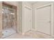 Bathroom featuring a tiled glass-door walk-in shower and neutral color palette at , Acworth, GA 30101