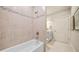 Bright bathroom featuring a tiled tub-shower combination and neutral color palette at , Acworth, GA 30101