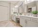 A bright bathroom with double sinks, vanity space, and a separate toilet and shower room at , Acworth, GA 30101