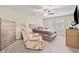 Cozy bedroom featuring a ceiling fan, plush carpet, and neutral tones throughout at , Acworth, GA 30101