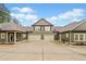 Charming exterior featuring multiple garages and stylish architectural details at , Acworth, GA 30101