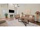 Bright living room with vaulted ceiling, fireplace, and comfortable seating at , Acworth, GA 30101