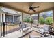 Relax on this covered patio, complete with comfortable seating and a ceiling fan at , Acworth, GA 30101
