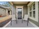 Inviting front porch with seating, creating a warm and welcoming entrance at , Acworth, GA 30101