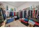 Spacious walk-in closet with ample shelving and hanging space for storage at , Acworth, GA 30101