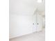 This bedroom boasts plush carpeting and a spacious closet for organized storage at 1236 Saxony Se Dr, Conyers, GA 30013