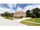 Elegant two-story brick home with lush landscaping and a spacious driveway at 1236 Saxony Se Dr, Conyers, GA 30013