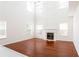 Spacious living room with fireplace, high ceilings, and plenty of natural light at 1236 Saxony Se Dr, Conyers, GA 30013