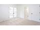 Carpeted office featuring French doors leading to the main hallway and a separate closet at 1236 Saxony Se Dr, Conyers, GA 30013