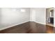 Bedroom with hardwood floors, natural light, and ensuite bathroom at 3032 Hartford Mill Pl, Duluth, GA 30097