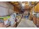 Unfinished basement with exposed ceiling, concrete walls, and some storage capabilities at 3080 Autumn Woods Ct, Douglasville, GA 30135