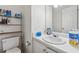 Bathroom featuring a white sink and toilet at 3080 Autumn Woods Ct, Douglasville, GA 30135