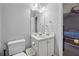 Bathroom with a light and sink next to the bedroom at 3080 Autumn Woods Ct, Douglasville, GA 30135