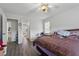 Bedroom with ceiling fan and an attached bathroom at 3080 Autumn Woods Ct, Douglasville, GA 30135