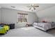 Bedroom with carpet flooring and a window with natural light at 3080 Autumn Woods Ct, Douglasville, GA 30135