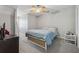 Bedroom featuring a ceiling fan and great natural lighting at 3080 Autumn Woods Ct, Douglasville, GA 30135