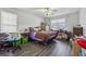 Bedroom with a ceiling fan and good natural lighting at 3080 Autumn Woods Ct, Douglasville, GA 30135