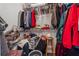 Walk-in closet that is packed with clothes and accessories at 3080 Autumn Woods Ct, Douglasville, GA 30135