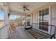 Inviting porch area featuring a swing and seating, perfect for relaxing outdoors at 3080 Autumn Woods Ct, Douglasville, GA 30135