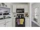 Cozy kitchen with white cabinets and an oven at 3080 Autumn Woods Ct, Douglasville, GA 30135