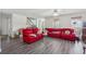 The living area has hardwood floors, natural light and space for a crowd at 3080 Autumn Woods Ct, Douglasville, GA 30135